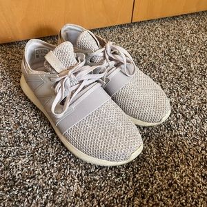 whiteish pink sneakers